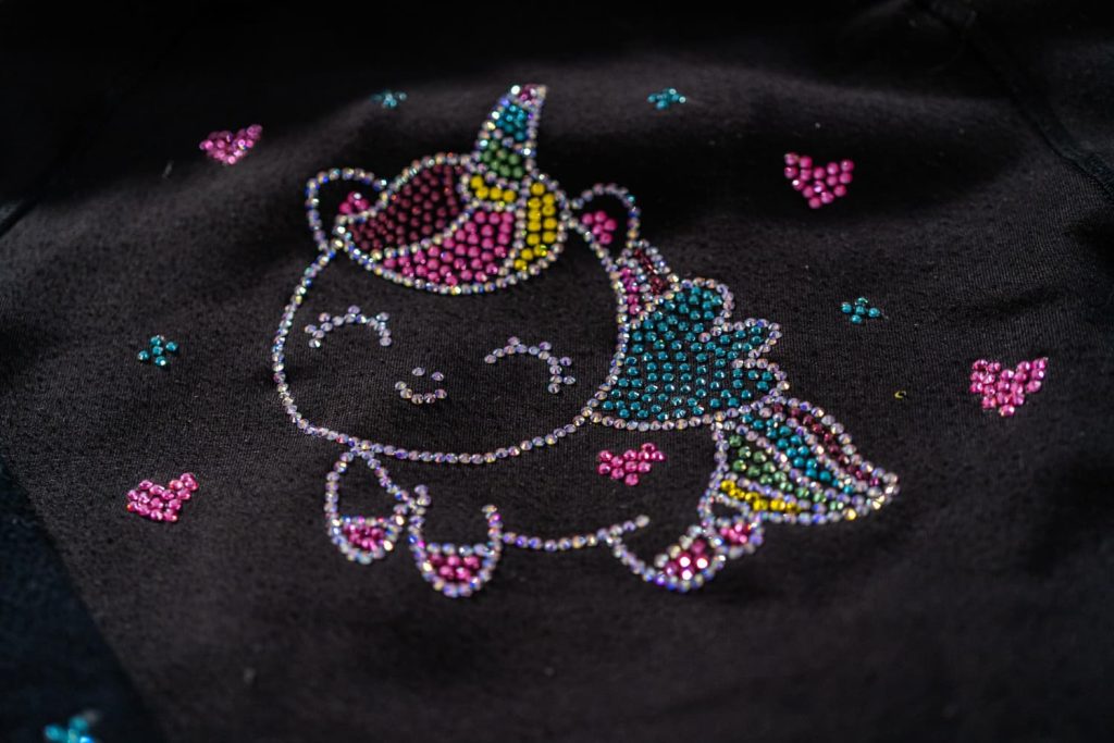 Sequined black hoodie in different types of hoodies