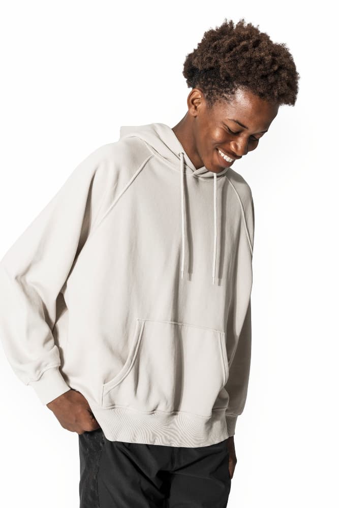Curly-haired man wearing a white blank hoodie