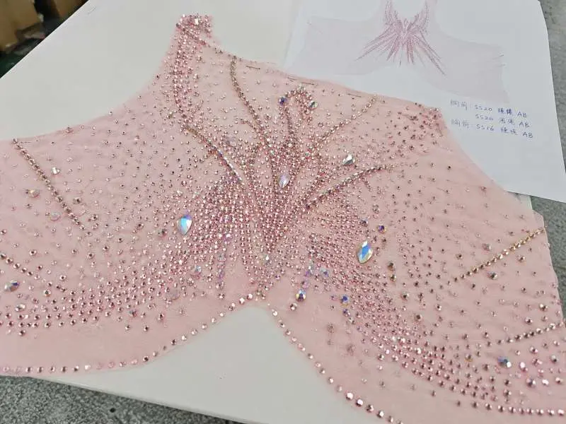 Rhinestone hot-fix placement sample on dance costume fabric panel